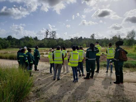 Stakeholders visit a rehabilitated quarry site in Guaico, Trinidad.