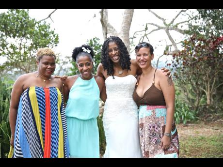 Nyree (second left) is in high spirits at her best friend Shakira Bouwer’s wedding. Also pictured are (from left) Ingrid Christie, Bouwer and Kimberley Hall.