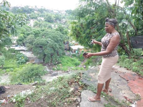 Carleen Dyce, resident of Kintyre, laments the impending disaster she faces while living on the edge. But she said she once had a sprawling backyard that had been victim to landslides.