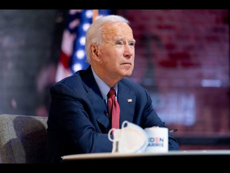 Democratic presidential candidate former Vice President Joe Biden attends a virtual public health briefing at The Queen theater in Wilmington, Del., Wednesday, Oct. 28, 2020. (AP Photo/Andrew Harnik)