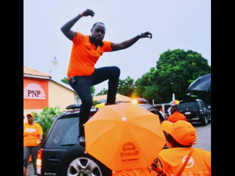 A Comrade celebrates Mark Golding’s victory over Lisa Hanna in the PNP presidential election at the party’s Old Hope Road headquarters in St Andrew on Saturday. Mark Golding has become the sixth president of the PNP.