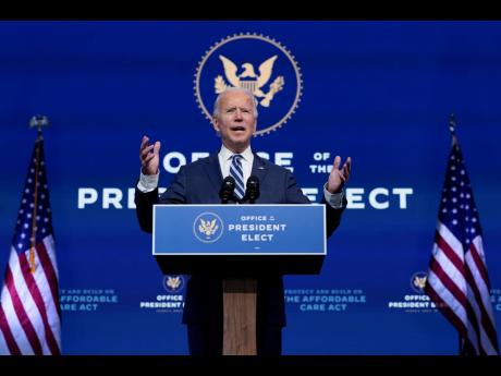 
President-elect Joe Biden speaks at The Queen theatre, Tuesday, November 10, 2020, in Wilmington, Delaware. 