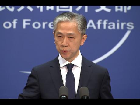 Chinese foreign ministry spokesman, Wang Wenbin, speaks during a routine press conference where he congratulated U.S. president-elect Joe Biden at the foreign ministry in Beijing.