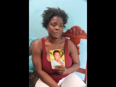 Annika Davidson, grieves the loss of her six-year-old son, Oshane Banton who went missing and was later found in sewage in a pumphouse in Lionel Town, Clarendon.