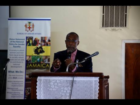 George Lewis, pastor of Constant Spring Church of God, addresses an International Men’s Day service in Kingston on November 15.