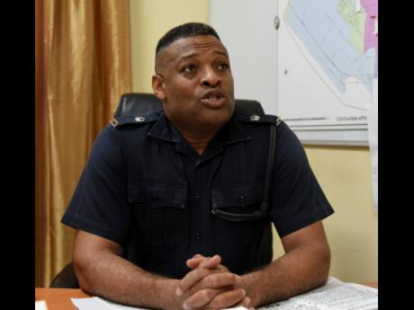 Superintendent of Police Leighton Gray, commanding officer for Kingston Western, says splintering gangs have worsened violence in the area. Murders in the tough police division are up 65 per cent and shootings 80 per cent year-on-year.