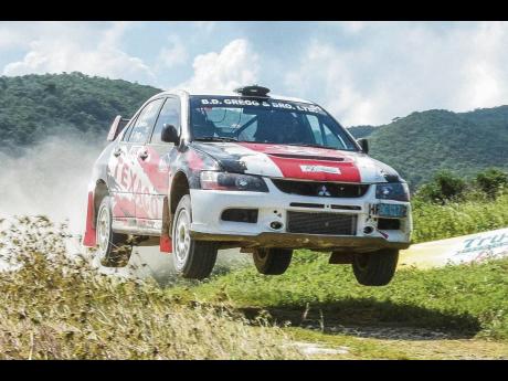 Kyle Gregg and Marcia Dawes in action in their MItsubishi Lancer Evolution IX rally car during Rally Jamaica 2018.