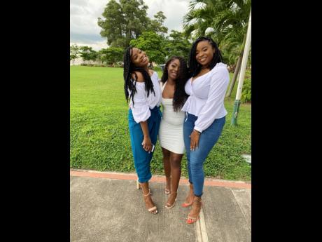 Is there a saying about friends who graduate together? There should be. Soon-to-be graduates (from left): Kimberly Blackwood, who was awarded a Bachelor of Laws; Allison Williams, BSc in economics and banking and finance; and Latoya Robinson, BSc in accoun