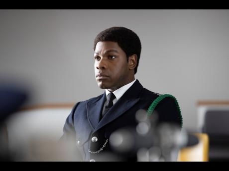 This image released by Amazon Studios shows John Boyega in a scene from ‘Red, White and Blue’.