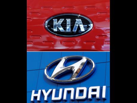 This combination of file photos shows the logo of Kia Motors and Hyndai during an unveiling ceremony, December 13, 2017, in Seoul, South Korea.