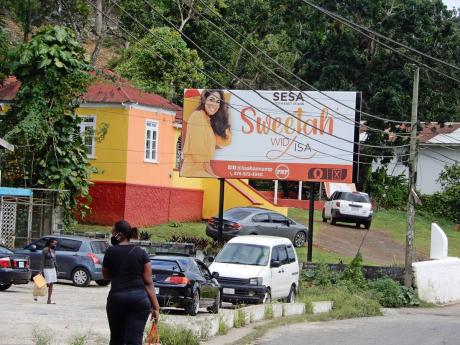 
A billboard with St Ann South Eastern Member of Parliament Lisa Hanna’s image graces the premises of her constituency office in Claremont, St Ann. 