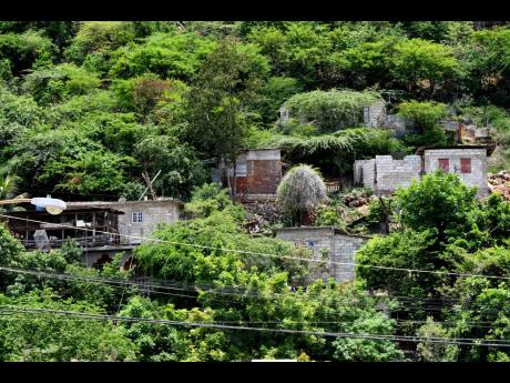 This May 2018 file photo shows a section of a squatting community on the hill behind Duhaney Park in St Andrew.