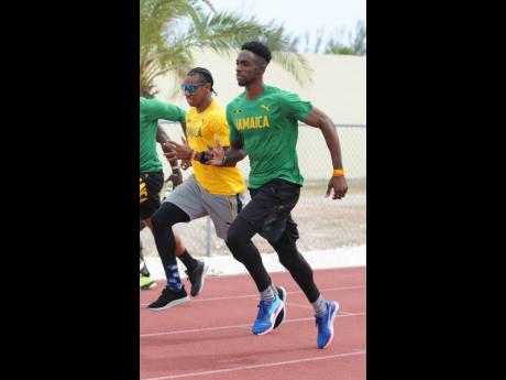 
Kemar Bailey-Cole (right) and Yohan Blake jog during a training session at the Thomas Robinson National Stadium in Nassau, Bahamas, on Friday April 21, 2017 during the World Relays.
