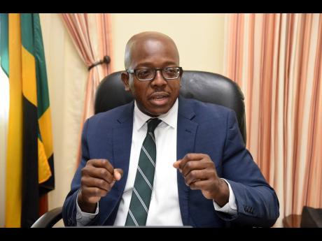 Pearnel Charles Jr, minister of housing, urban renewal, environment and climate change, says he has no problem sharing elements of his portfolio with Prime Minister Andrew Holness.