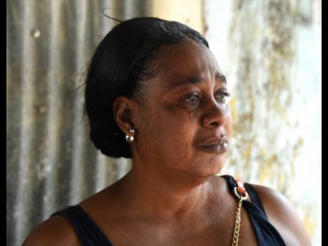 Sheryl McEachron is overcome with emotion as she recalls how she learnt about son Husoni Pennant’s death. The 26-year-old and 18-year-old Kybuki Smith were found with chop wounds along Dyke Road in St Catherine on Saturday.