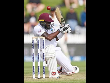 West Indies's Jermaine Blackwood has the ball fly over his head while batting against New Zealand during play on day three of their first cricket test in Hamilton, New Zealand, Saturday, Dec. 5, 2020. (Andrew Cornaga/Photosport via AP)