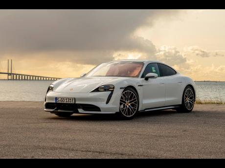
This undated photo provided by Porsche shows the 2020 Porsche Taycan, Porsche’s first all-electric car. 