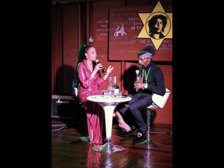 Munga Honorable answers questions from host Tamiann Young during a sitdown, after his performance. 