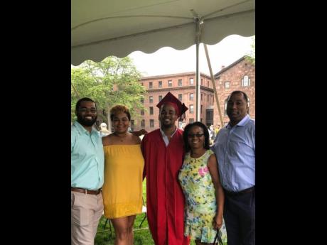 SAJ President William Brown (right) is pictured with his family (from left): Stefan (son), Jada (daughter), Dominic (son) and Dr Charmaine Watson-Brown (wife) at son Dominic’s graduation from Wesleyan University.