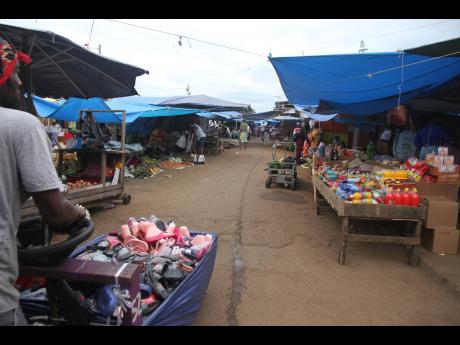 Vendors are lamenting the conditions under which they now operate as without the shops, they face high transportation costs to move goods into and out of the market daily.