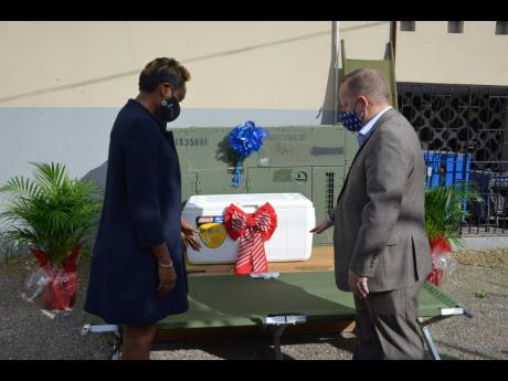 Minister of state in the Ministry of Health and Wellness Juliet Cuthbert Flynn accepted a donation of medical equipment and supplies valued at more than US$300,000 from the United States Embassy’s Chargé d’Affaires John McIntyre at Glen Vincent Health