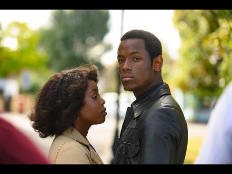 Martha (left), played by Amarah-Jae St Aubyn and Franklyn, played by Jamaica-born actor, Micheal Ward, in a scene from ‘Lovers Rock’. 