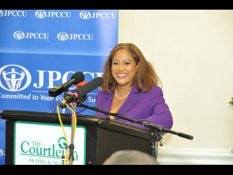 President of MoneyMasters Limited, Claudette Crooks, speaks at the announcement of a deferred share offer from the Jamaica Police Cooperative Credit Union, on Thursday, December 11, 2020 at the Courtleigh Hotel in New Kingston.