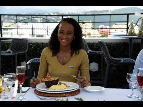 Alyssia Senior could not wait to indulge in the flavours of her garlic lobster.