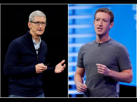 In this combo of file photos, Apple CEO Tim Cook is at left and Facebook CEO Mark Zuckerberg is at right.