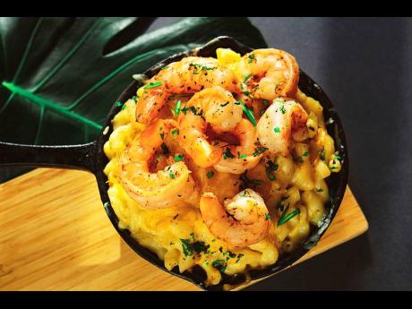 This melted shrimp mac and cheese has not one, but three different types of cheeses. 