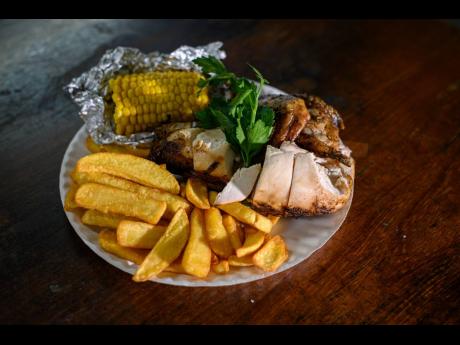 Among the best sellers at PeppaThyme, jerked chicken and sides like specially cut fries and corn. 