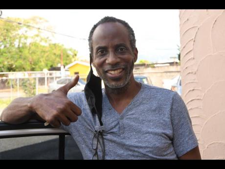 Gregory Stewart said he is satisfied with the service MailPac offers at its Altamont Crescent, New Kingston, office.