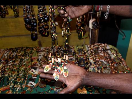 Zodiac sign bead chains made by Glenford Bennett in Trench Town, Kingston.
