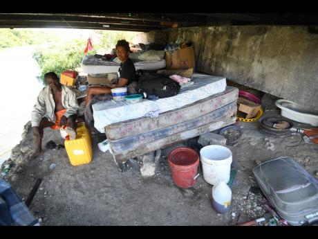 Paul Grant and Kimone Lewis have been living under a bridge in Edgewater, Portmore, St Catherine, for the past 18 years.