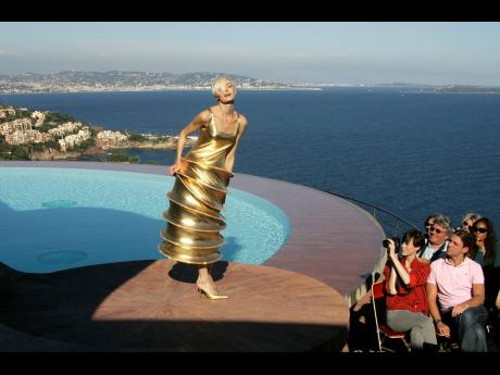 A model wears a creation by French fashion designer Pierre Cardin during the presentation of his entire Spring-Summer 2009 and Autumn-Winter 2009 collections at his villa in Theoule sur Mer, southern France.