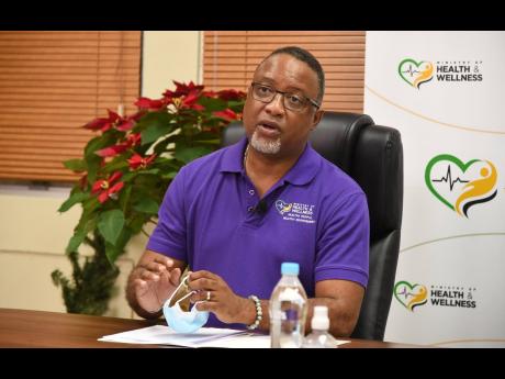 Permanent Secretary in the Ministry of Health and Wellness, Dunstan Bryan, speaks at a virtual press conference, on Saturday, January 2, at the Ministry of Health and Wellness, in Kingston.