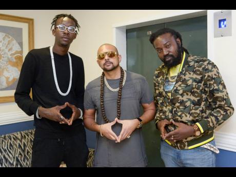 From left:  Artistes Chi Ching Ching, Sean Paul and Ras Ajai at  the Reggae Month 2020 launch. 
