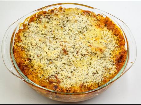 The casserole should be baked for 20 to 25 minutes until it is hot, and the cheese is lightly browned on top.