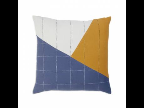 This image provided by Brooklinen shows an Anchal pillow. Artist Colleen Clines went to India while attending the Rhode Island School of Design. Working with textiles with women there inspired her to found the non-profit Anchal Project with her sister, Mag