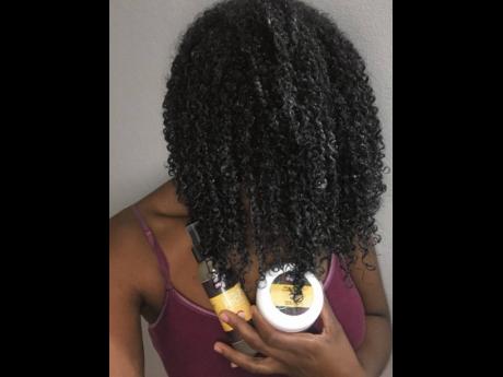 Wisdom uses her citrus rice hair treatment for moisture and growth. 