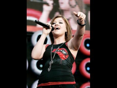 Musician Kelly Clarkson performs during the Live Earth New York concert in East Rutherford.
