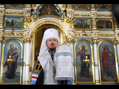 Metropolitan Veniamin of Minsk and Zaslavl, Patriarchic exarch of the whole Belarus, leads a liturgy on Orthodox Christmas Eve at an Orthodox Cathedral church in Minsk, Belarus, Wednesday, January 6, 2021. This is the first Christmas Mass of Metropolitan V