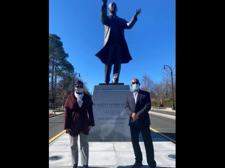 Jamaica-born Basil Watson (left) and Keisha Lance Bottom, mayor of Atlanta, Georgia, at the ribbon cutting of the unveiling of Martin Luther King Jr’s statue.