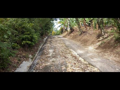 A section of the road in Marlie, St Mary, which is in urgent need of repair. 