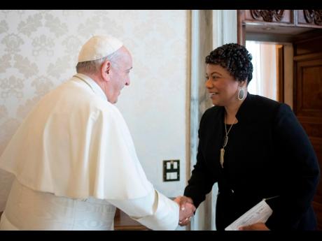 In this March 12, 2018 file photo, youngest child of civil rights leader Martin Luther King Jr, Bernice King, is welcomed by Pope Francis on the occasion of their private audience at the Vatican.