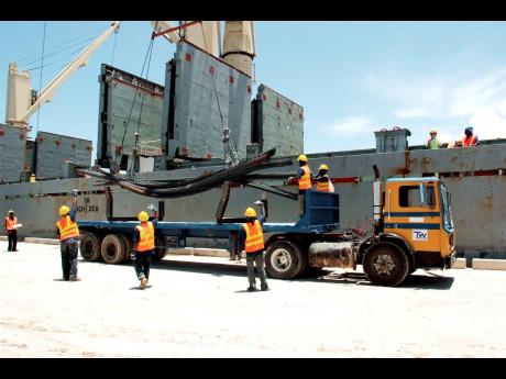 This Gleaner file photo shows steel being offloaded at the Tank-Weld port in Rio Bueno, Trelawny.