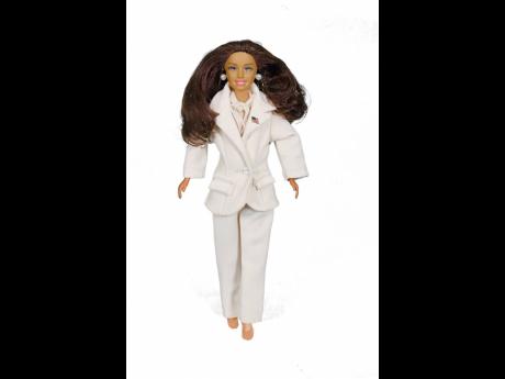 Like Kamala Harris on the night she gave her acceptance speech, the doll is dressed in head-to-toe white. The doll’s suit is a copy of Harris’ Carolina Herrera pantsuit, and there are other small details such as the lavallière blouse and pearl earring