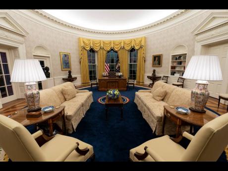 The Oval Office of the White House is newly redecorated for the first day of President Joe Biden’s administration.