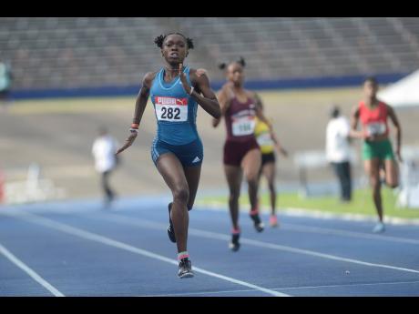 Petersfield High School’s Shaquena Foote wins the final of the girl’s Under-20 400m race at the Jamaica Athletics Administrative Association Carifta Games Trials at the National Stadium on Saturday, April 6, 2019.