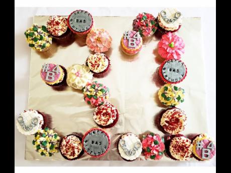 Twenty-four assorted cupcakes form the number 31 in this special birthday creation. 